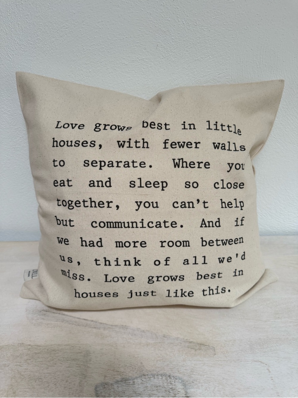 Decorative Cream Throw Pillow with Black Text - Love Grows Quote